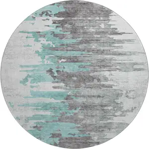 Photo of 8' Teal Gray And Ivory Abstract Washable Round Rug With UV Protection