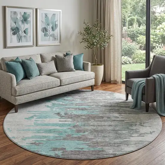 8' Teal Gray And Ivory Abstract Washable Round Rug With UV Protection Photo 1