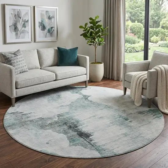 8' Teal Gray And Ivory Abstract Washable Round Rug With UV Protection Photo 1