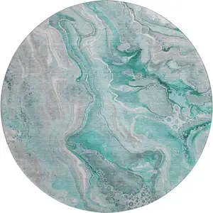 Photo of 8' Teal Gray And Ivory Abstract Washable Round Rug With UV Protection