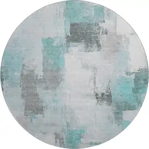 Photo of 8' Teal Gray And Ivory Abstract Washable Round Rug With UV Protection