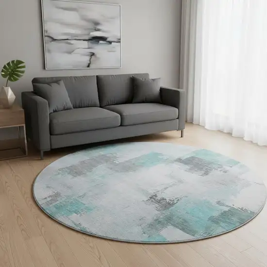 8' Teal Gray And Ivory Abstract Washable Round Rug With UV Protection Photo 2