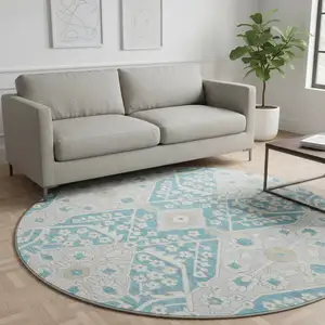 Photo of 8' Teal Gray And Ivory Floral Washable Round Rug With UV Protection