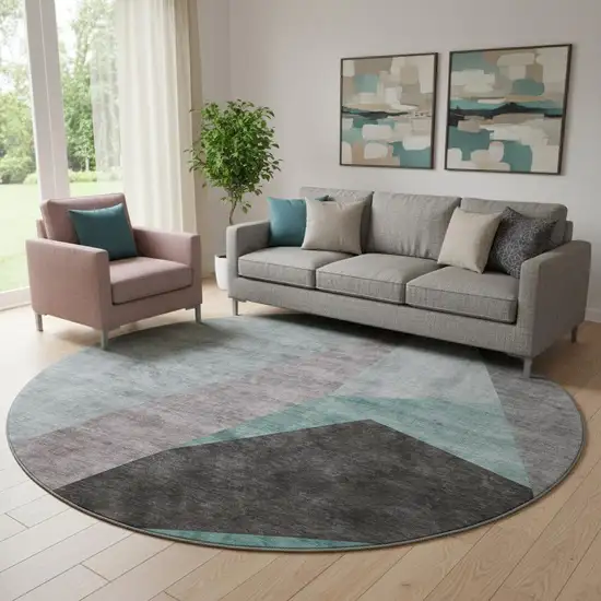 8' Teal Gray And Ivory Geometric Washable Round Rug With UV Protection Photo 1