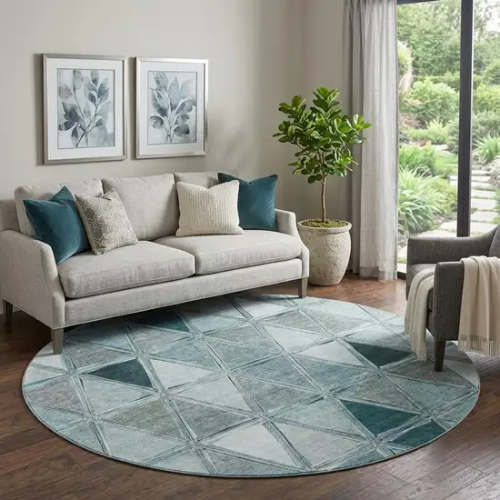 8' Teal Gray And Ivory Geometric Washable Round Rug With UV Protection Photo 1