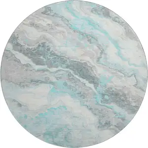 Photo of 8' Teal Gray And Silver Abstract Washable Round Rug With UV Protection