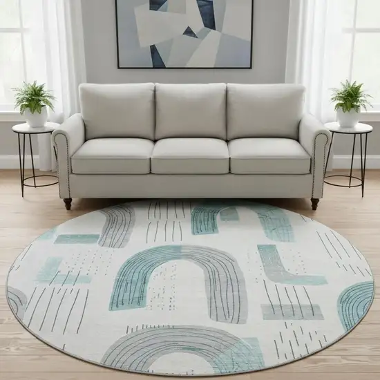 8' Teal Gray And Silver Geometric Washable Round Rug With UV Protection Photo 2