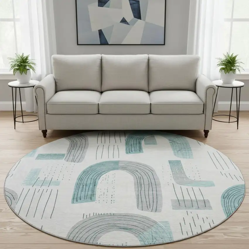 8' Teal Gray And Silver Geometric Washable Round Rug With UV Protection Photo 2