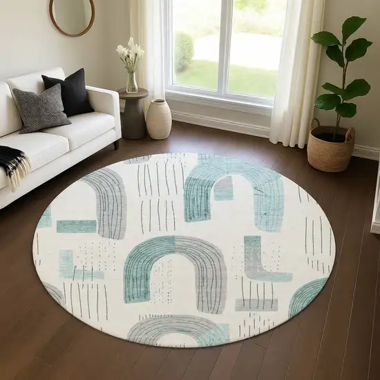 8' Teal Gray And Silver Geometric Washable Round Rug With UV Protection Photo 4
