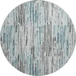 Photo of 8' Teal Gray And Silver Striped Washable Round Rug With UV Protection