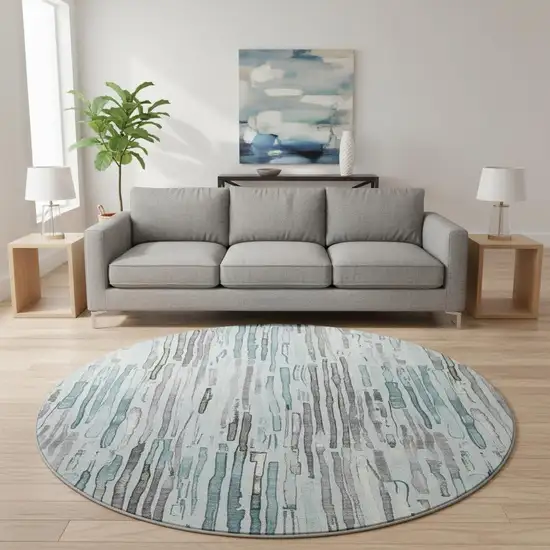8' Teal Gray And Silver Striped Washable Round Rug With UV Protection Photo 2