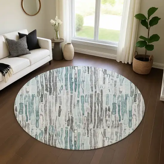 8' Teal Gray And Silver Striped Washable Round Rug With UV Protection Photo 4
