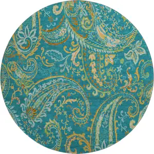 Photo of 8' Teal Green And Gold Paisley Washable Round Rug With UV Protection