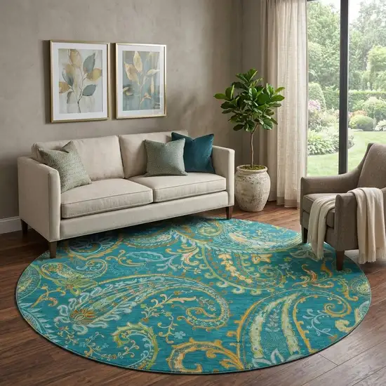 8' Teal Green And Gold Paisley Distressed Washable Round Rug With UV Protection Photo 1