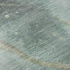 Photo of 8' Teal Green And Ivory Abstract Washable Area Rug With UV Protection