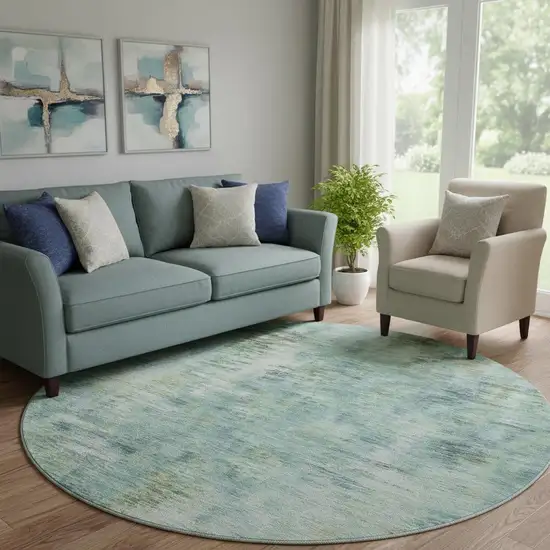 8' Teal Green And Ivory Abstract Washable Round Rug With UV Protection Photo 1