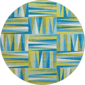 Photo of 8' Teal Green And Ivory Geometric Washable Round Rug With UV Protection