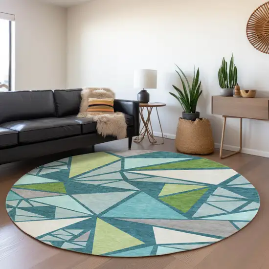 8' Teal Green And Ivory Geometric Washable Round Rug With UV Protection Photo 4