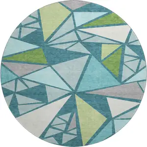 Photo of 8' Teal Green And Ivory Geometric Washable Round Rug With UV Protection
