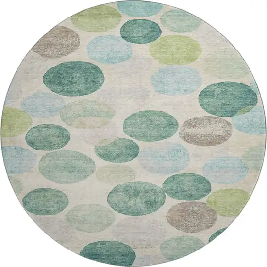 8' Teal Green And Ivory Geometric Washable Round Rug With UV Protection Photo 1