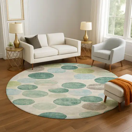 8' Teal Green And Ivory Geometric Washable Round Rug With UV Protection Photo 5
