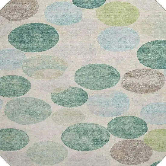 8' Teal Green And Ivory Geometric Washable Round Rug With UV Protection Photo 3
