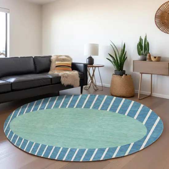8' Teal Ivory And Aqua Striped Washable Round Rug With UV Protection Photo 4