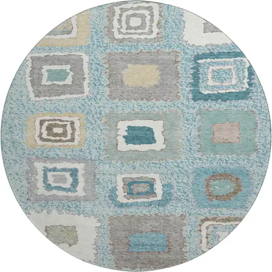 8' Teal Ivory And Beige Geometric Washable Round Rug With UV Protection Photo 1