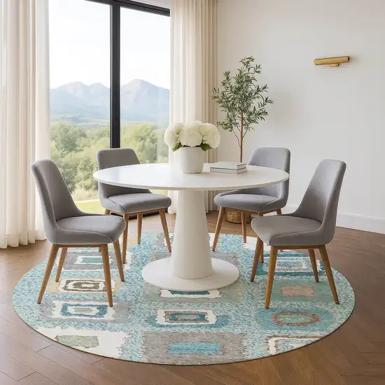 8' Teal Ivory And Beige Geometric Washable Round Rug With UV Protection Photo 5