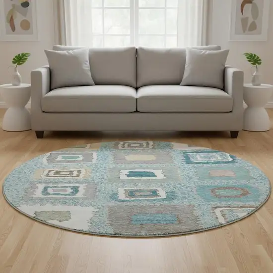 8' Teal Ivory And Beige Geometric Washable Round Rug With UV Protection Photo 2
