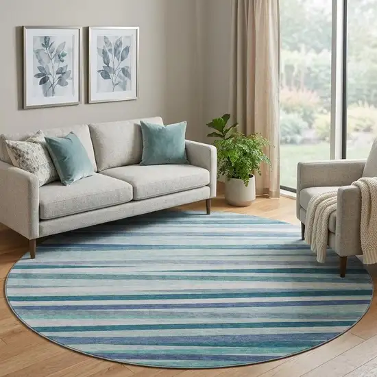8' Teal Ivory And Blue Striped Washable Round Rug With UV Protection Photo 1