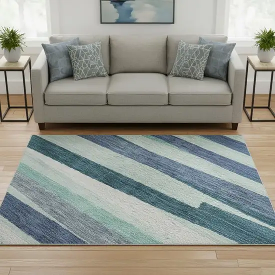 8' Teal Ivory And Blue Striped Washable Round Rug With UV Protection Photo 2