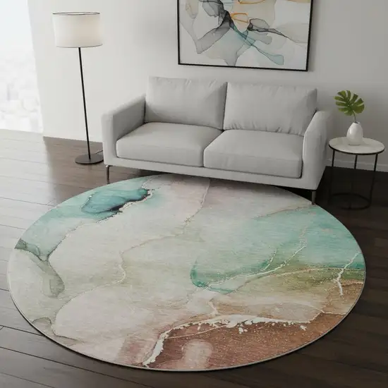 8' Teal Ivory And Brown Abstract Washable Round Rug With UV Protection Photo 2