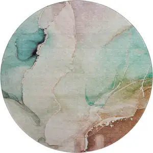 Photo of 8' Teal Ivory And Brown Abstract Washable Round Rug With UV Protection