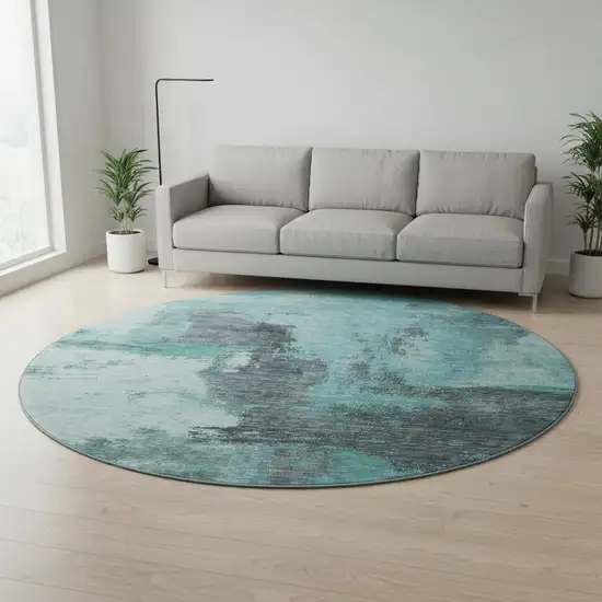 8' Teal Ivory And Charcoal Abstract Washable Round Rug With UV Protection Photo 1