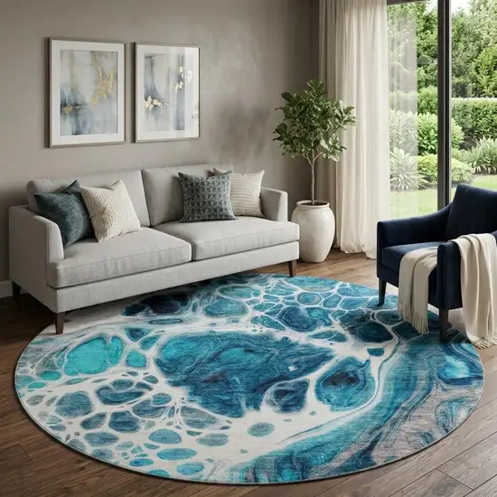 8' Teal Ivory And Gray Abstract Washable Round Rug With UV Protection Photo 1