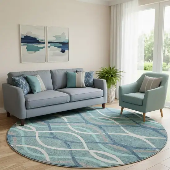 8' Teal Ivory And Gray Abstract Washable Round Rug With UV Protection Photo 1