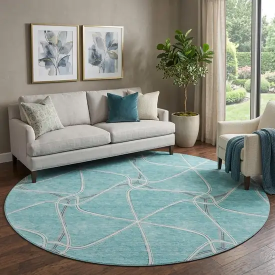 8' Teal Ivory And Gray Geometric Washable Round Rug With UV Protection Photo 1