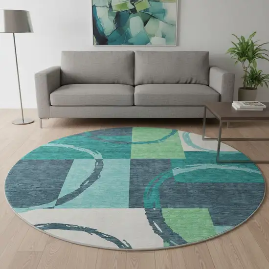 8' Teal Ivory And Green Geometric Washable Round Rug With UV Protection Photo 2