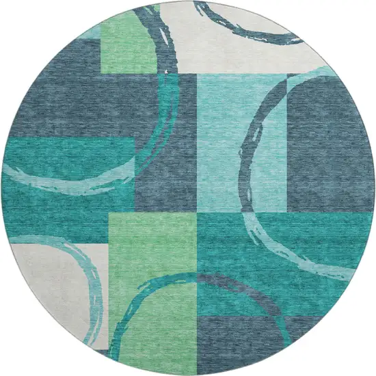 8' Teal Ivory And Green Geometric Washable Round Rug With UV Protection Photo 1