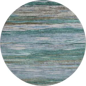 Photo of 8' Teal Khaki And Green Abstract Washable Round Rug With UV Protection