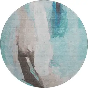 Photo of 8' Teal Khaki And Ivory Abstract Washable Round Rug With UV Protection