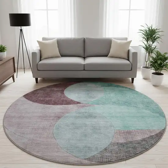 8' Teal Mauve And Blush Geometric Washable Round Rug With UV Protection Photo 2