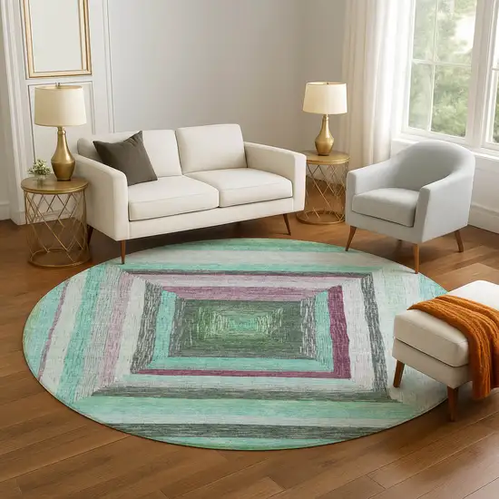 8' Teal Mauve And Ivory Geometric Washable Round Rug With UV Protection Photo 5