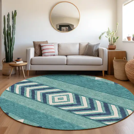 8' Teal Navy Blue And Ivory Southwestern Washable Round Rug With UV Protection Photo 4