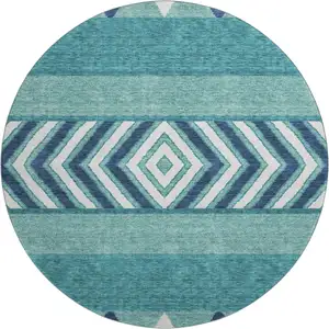 Photo of 8' Teal Navy Blue And Ivory Southwestern Washable Round Rug With UV Protection