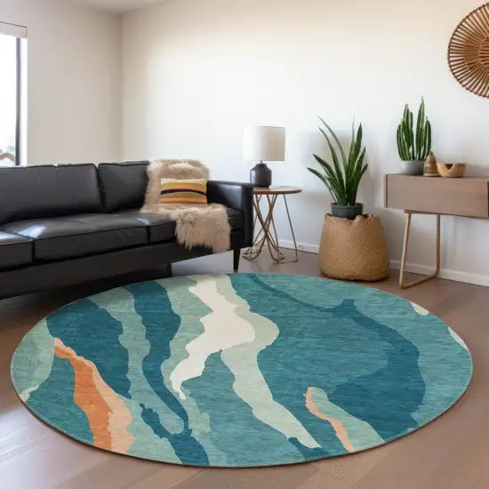 8' Teal Orange And Ivory Abstract Washable Round Rug With UV Protection Photo 4