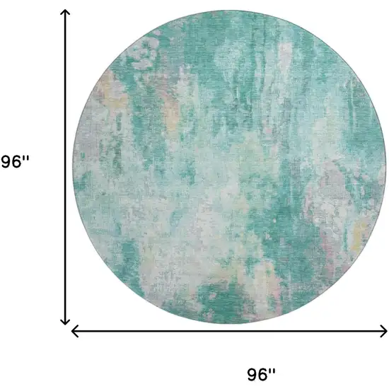 8' Teal Peach And Ivory Abstract Washable Round Rug With UV Protection Photo 9