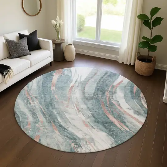 8' Teal Peach And Ivory Abstract Washable Round Rug With UV Protection Photo 4