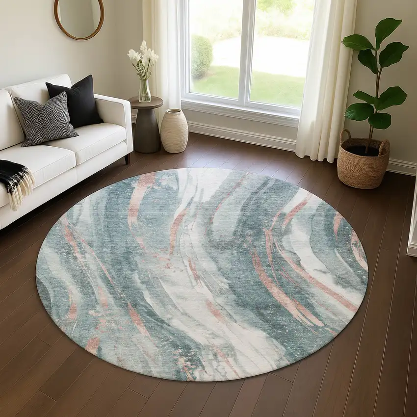 8' Teal Peach And Ivory Abstract Washable Round Rug With UV Protection Photo 4